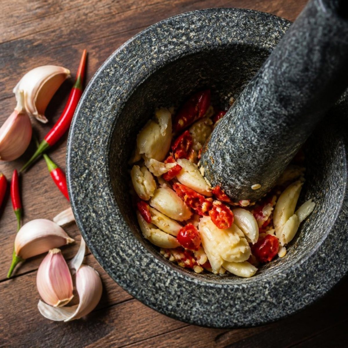 Garlic and chili pounded in a mortar